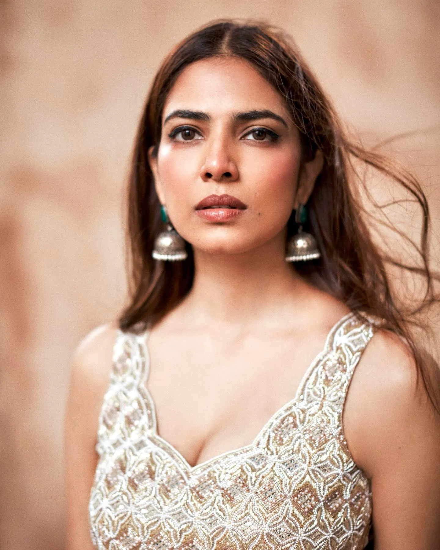 Beautiful Malavika Mohanan in White Blouse with Soft Gaze