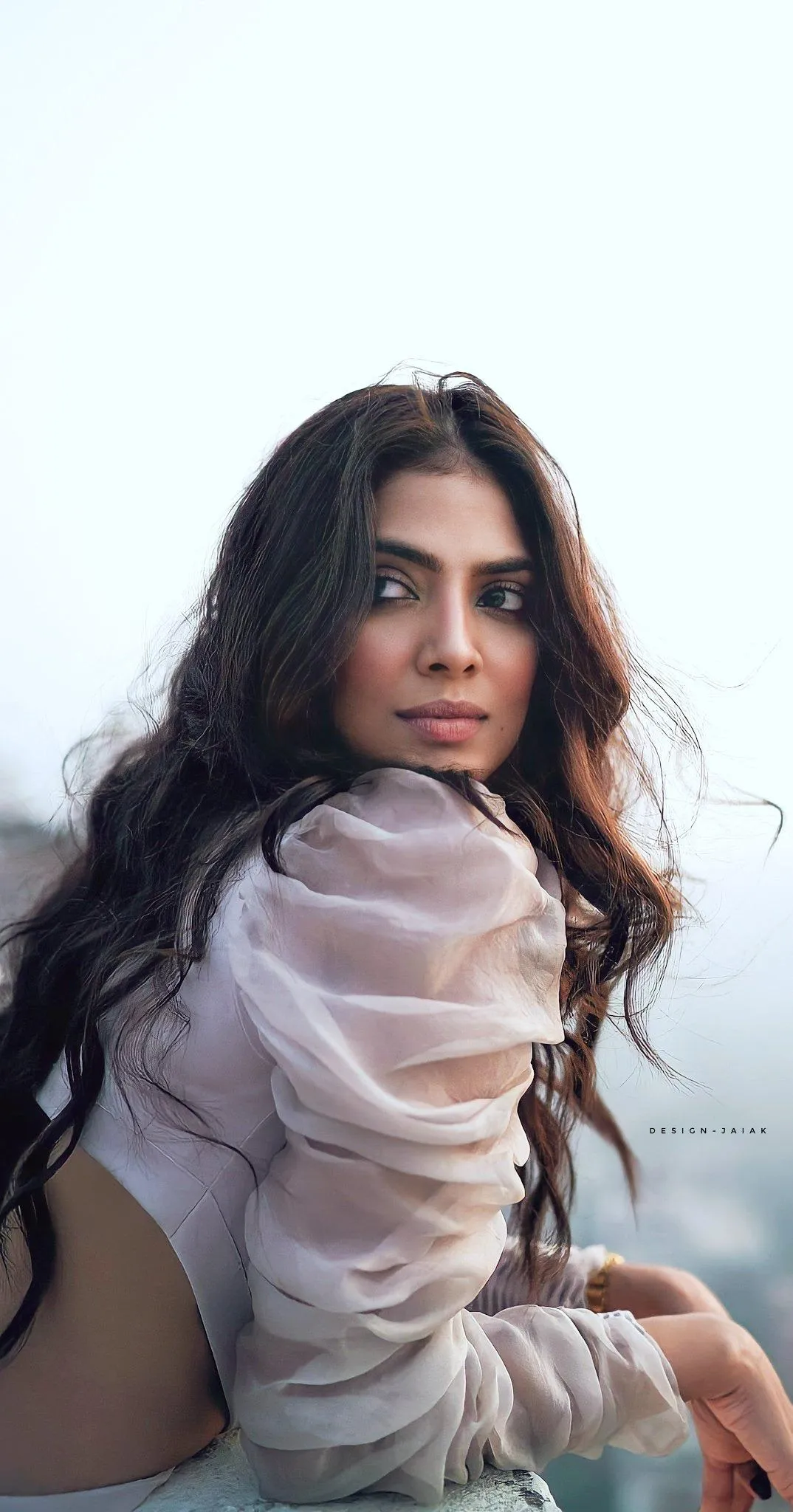 Beautiful Malavika Mohanan in White Dress Chic Bold Look