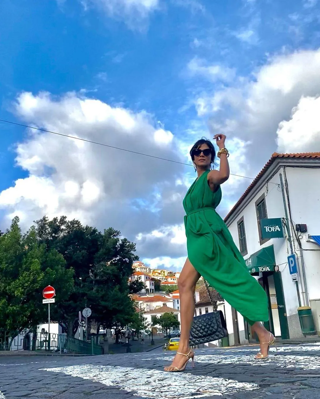 Beautiful Malavika Mohanan Posing Outdoors in Green Dress