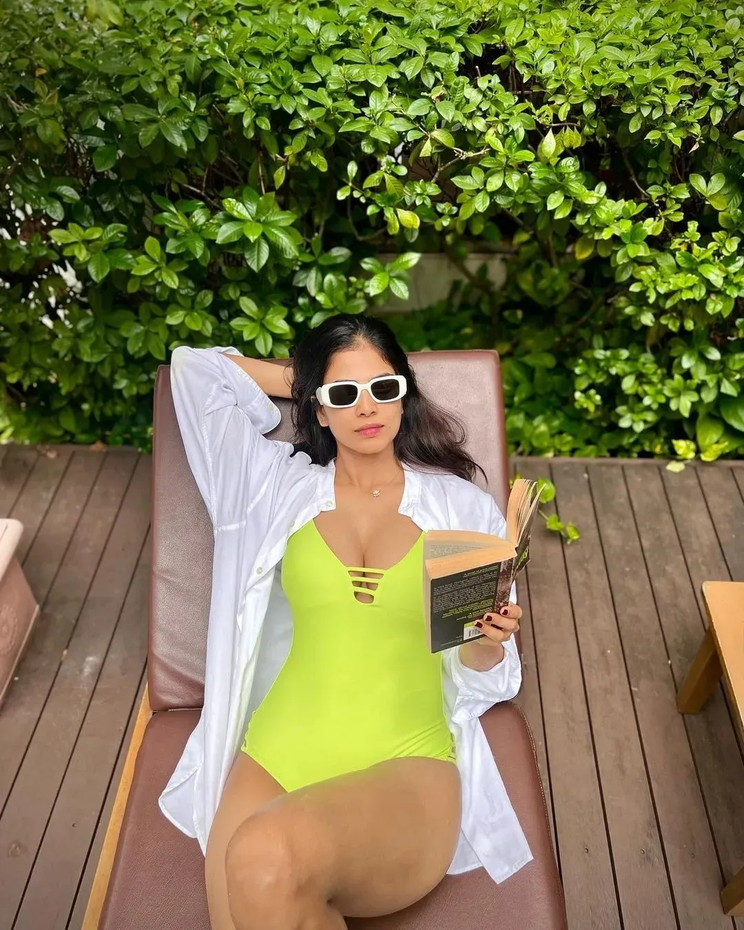 Beautiful Malavika Mohanan Relaxing by the Pool in Yellow