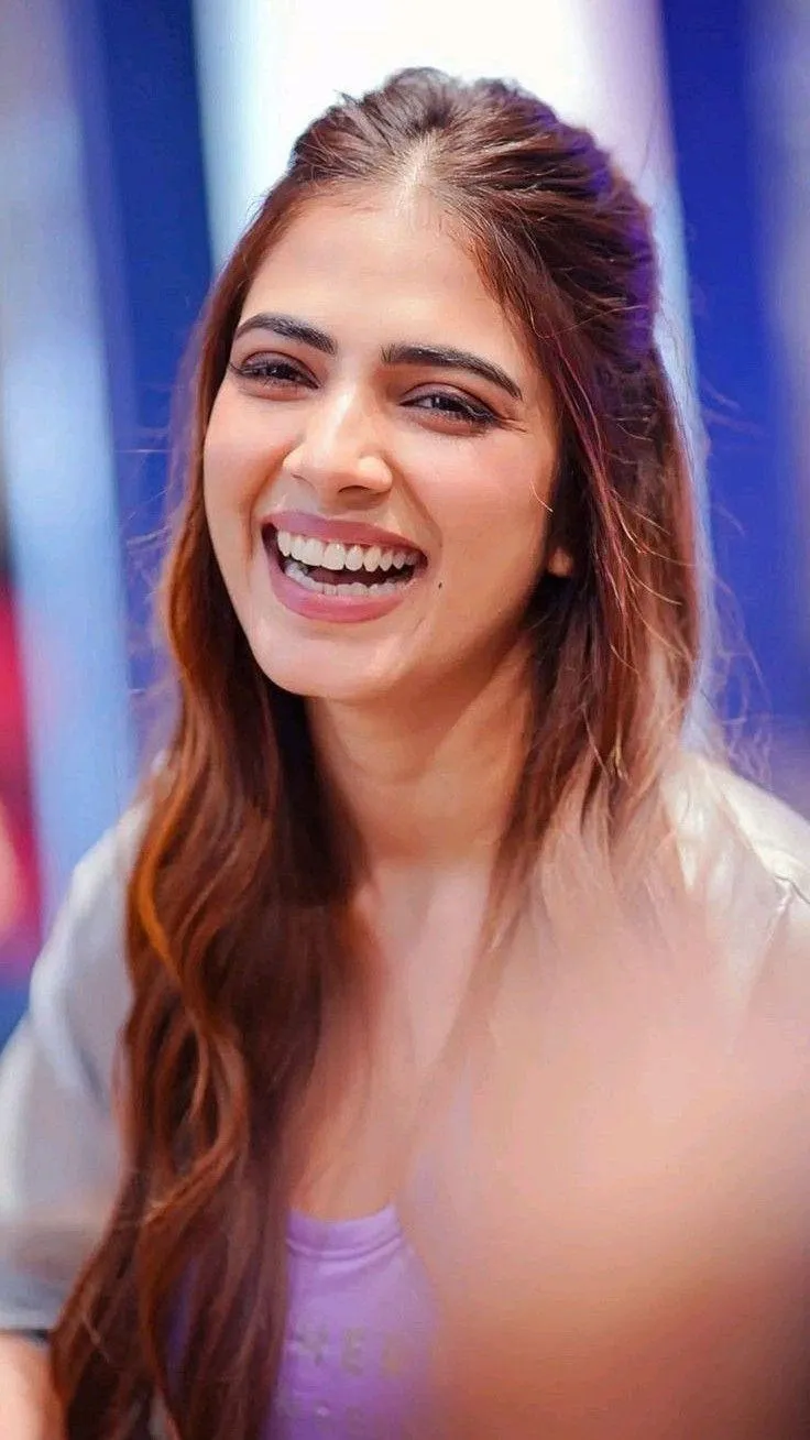 Beautiful Malavika Mohanan Smiling Brightly with Charm Image