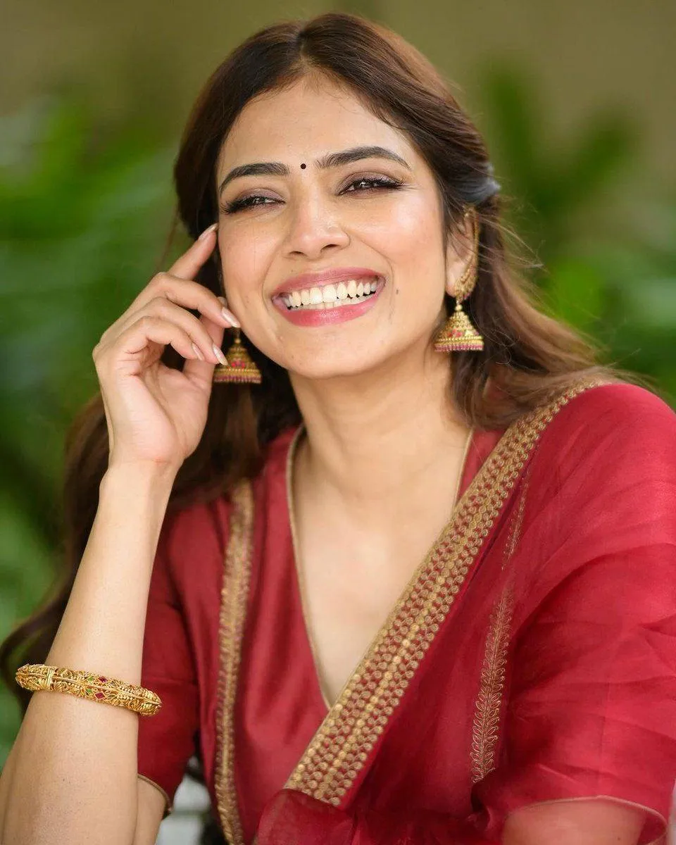 Beautiful Malavika Mohanan Smiling Look in Red Ethnic Wear