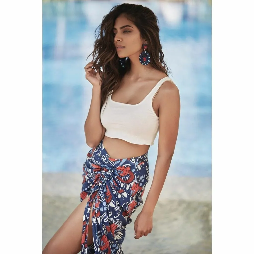 Beautiful Malavika Mohanan Walks in Floral White Top Image