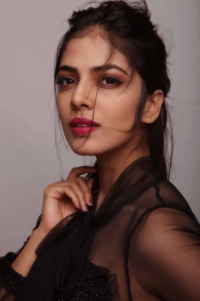 Bold Look of Malavika Mohanan Hot Black Outfit with Pose