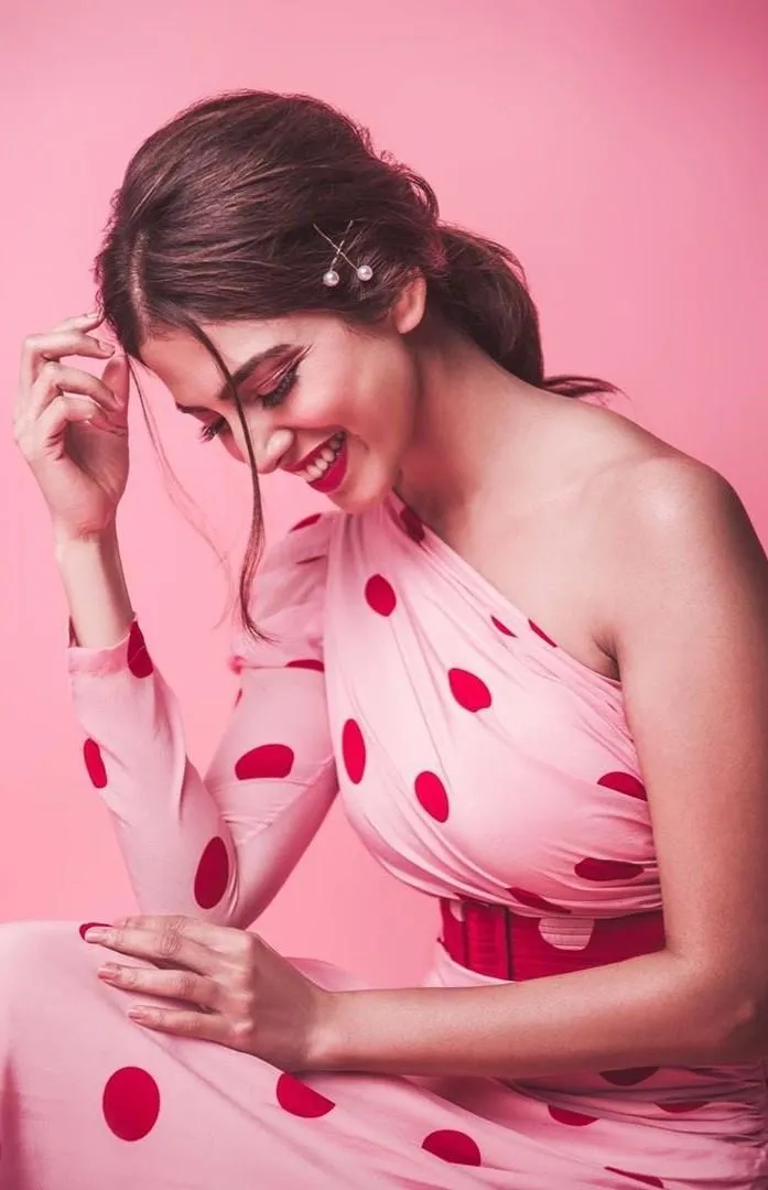 Charming Malavika Mohanan Dressed in Stylish Pink Outfit