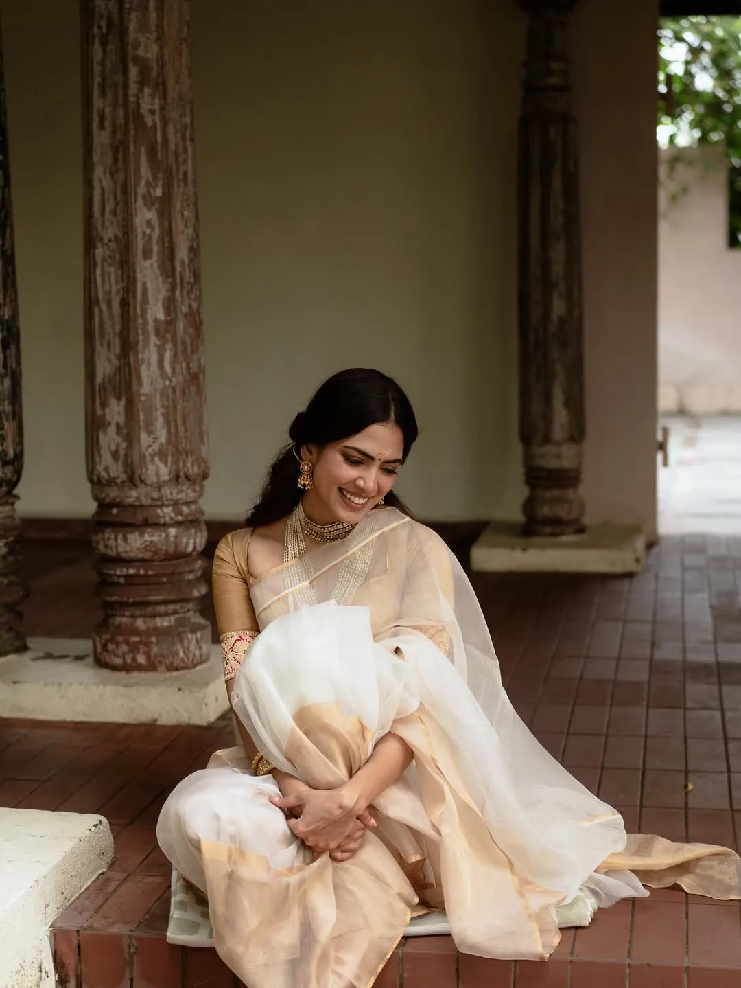 Charming Malavika Mohanan Gorgeous Stunning Sitting Pose