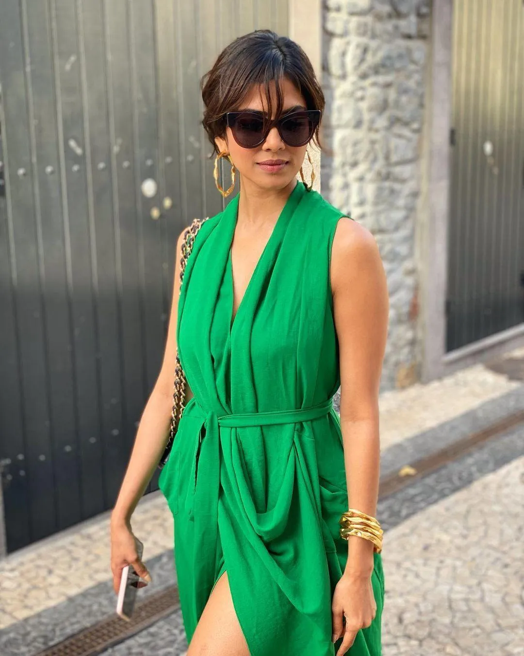 Charming Malavika Mohanan in Green Dress and Dark Glasses