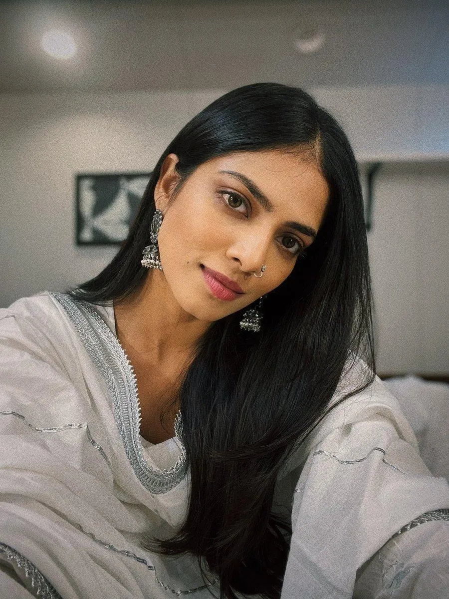 Charming Malavika Mohanan in Grey Dress Natural Look Image