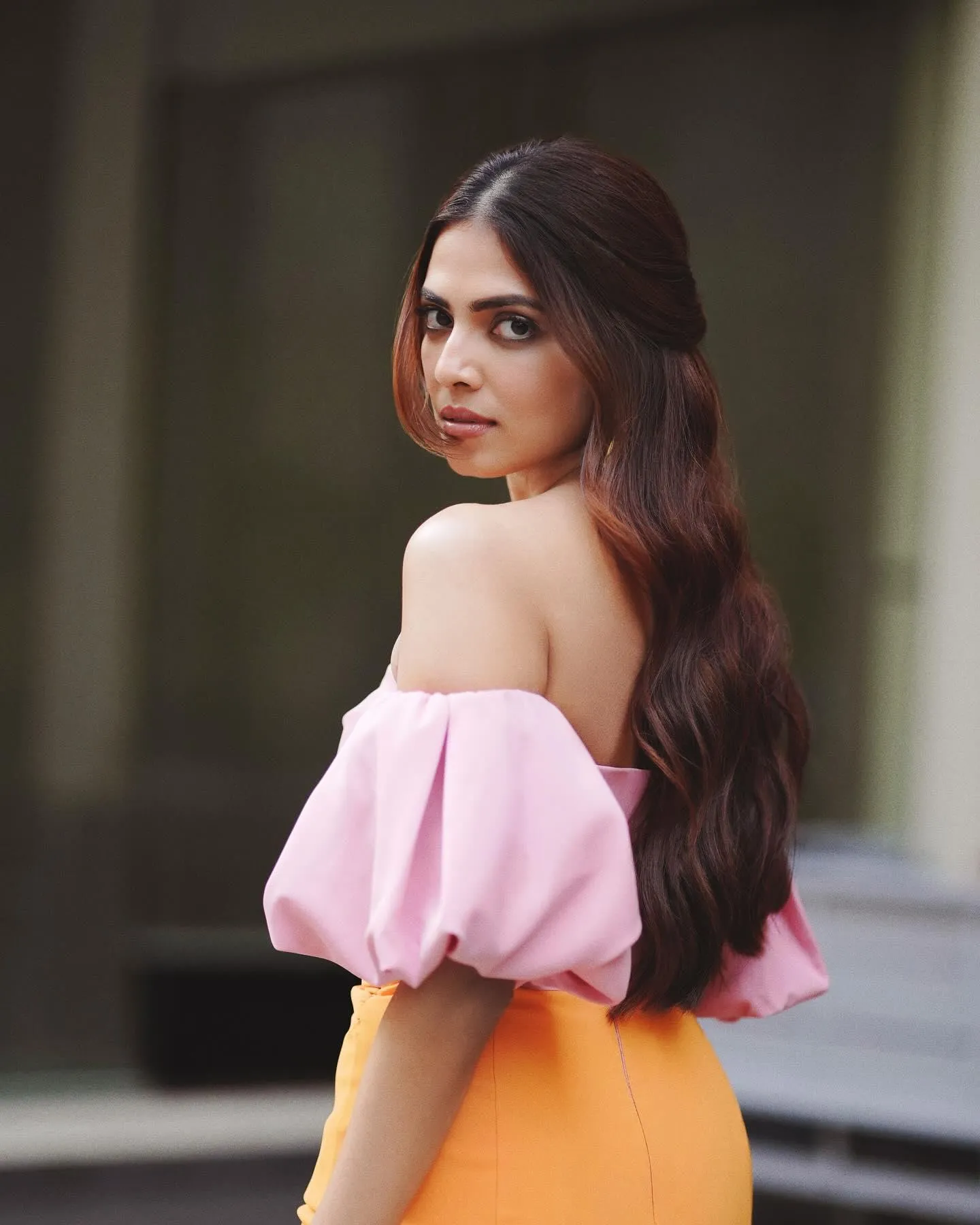 Charming Malavika Mohanan in Pink Top with Yellow Skirt