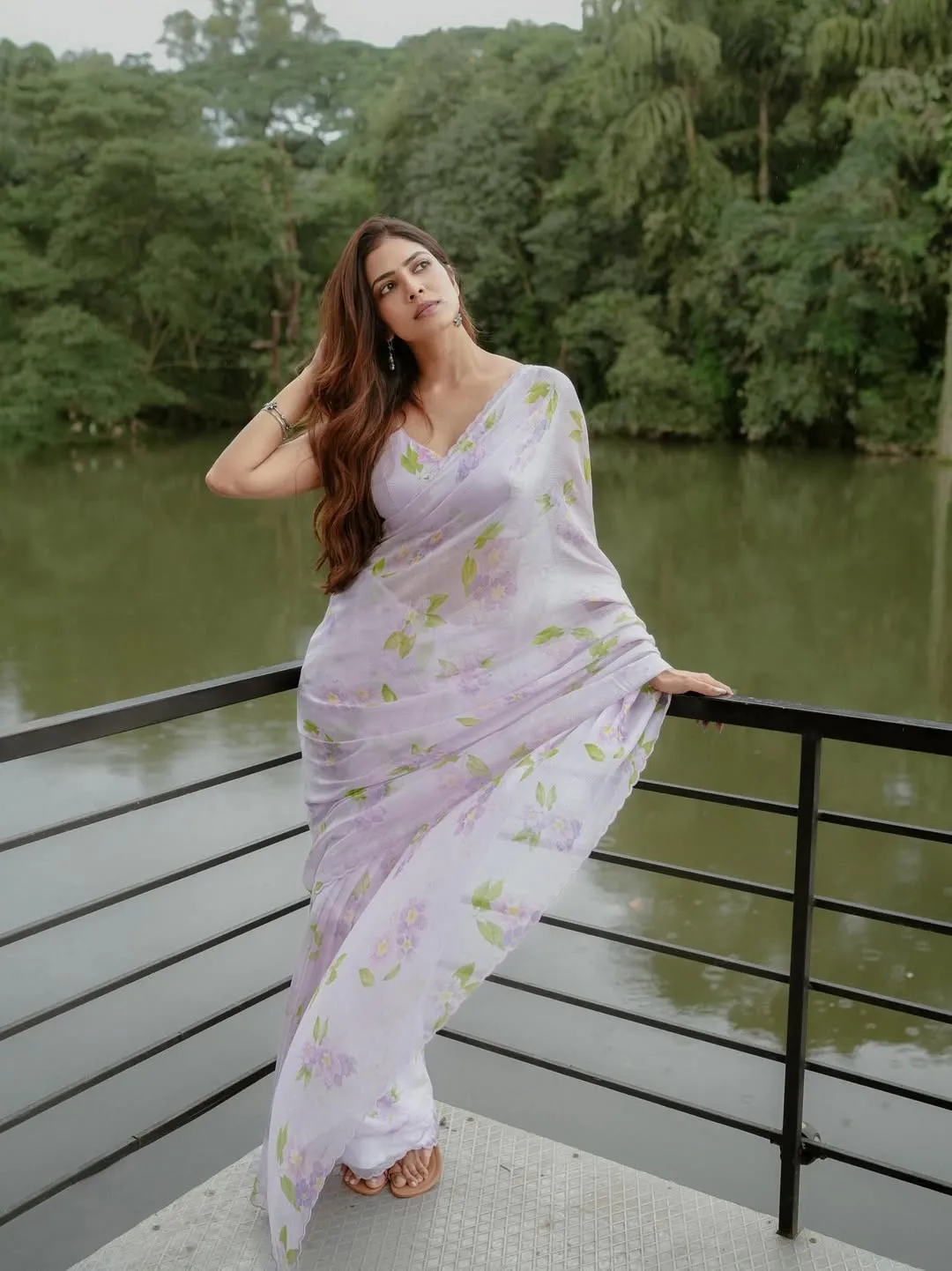 Charming Malavika Mohanan in White Dress Posing Outdoors