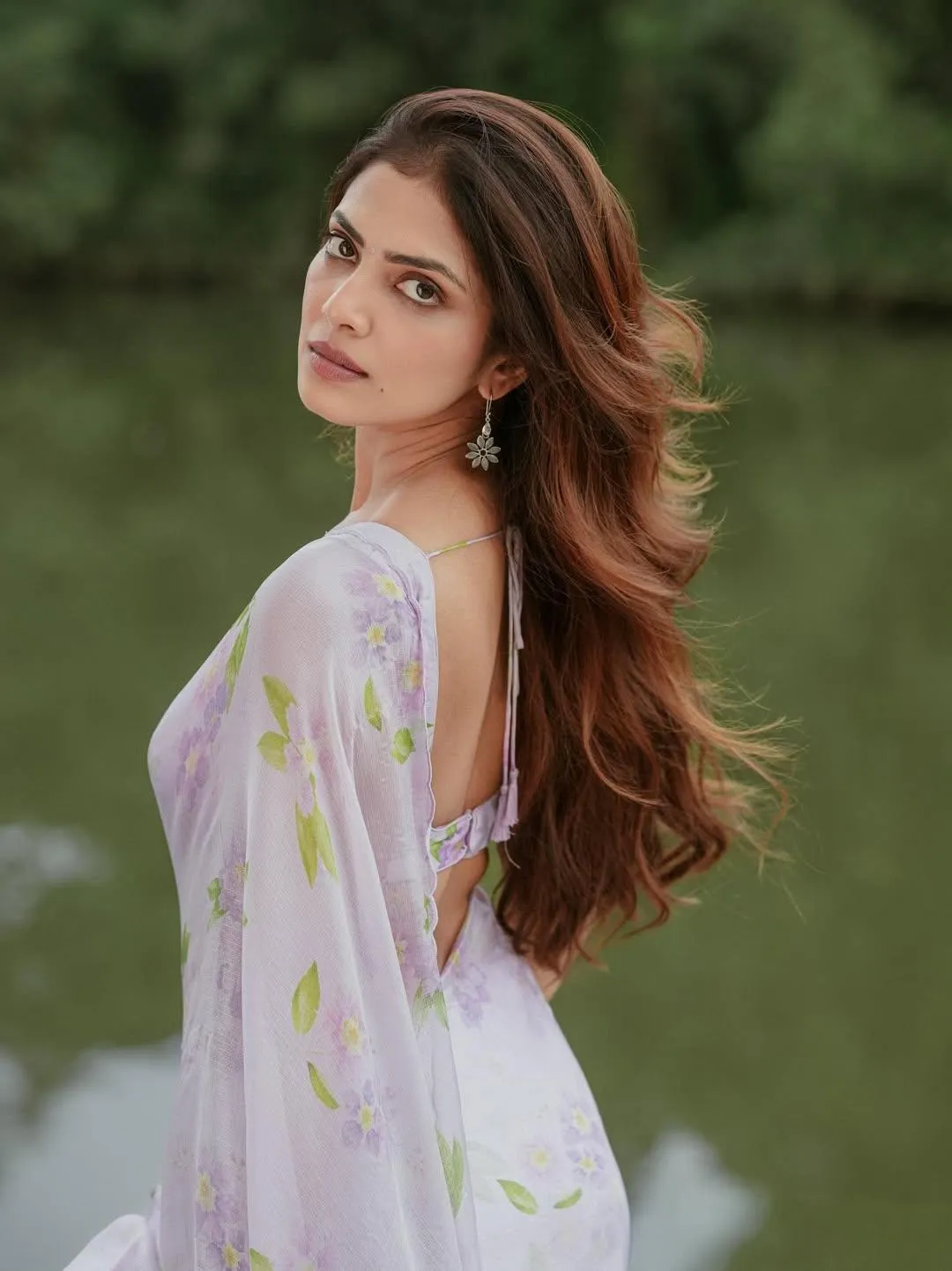 Charming Malavika Mohanan Wearing a Soft White Dress Picture