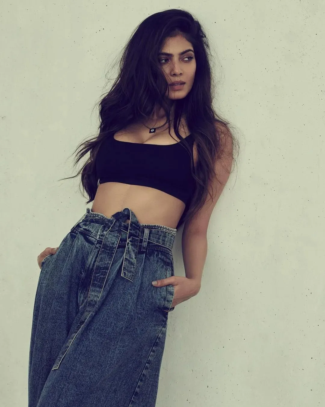 Charming Malavika Mohanan Wearing Black Crop Top and Jeans