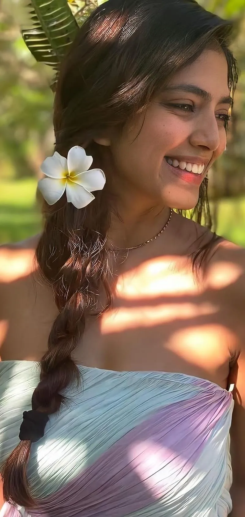 Charming Photo of Malavika Mohanan Posing Outdoors in Gown