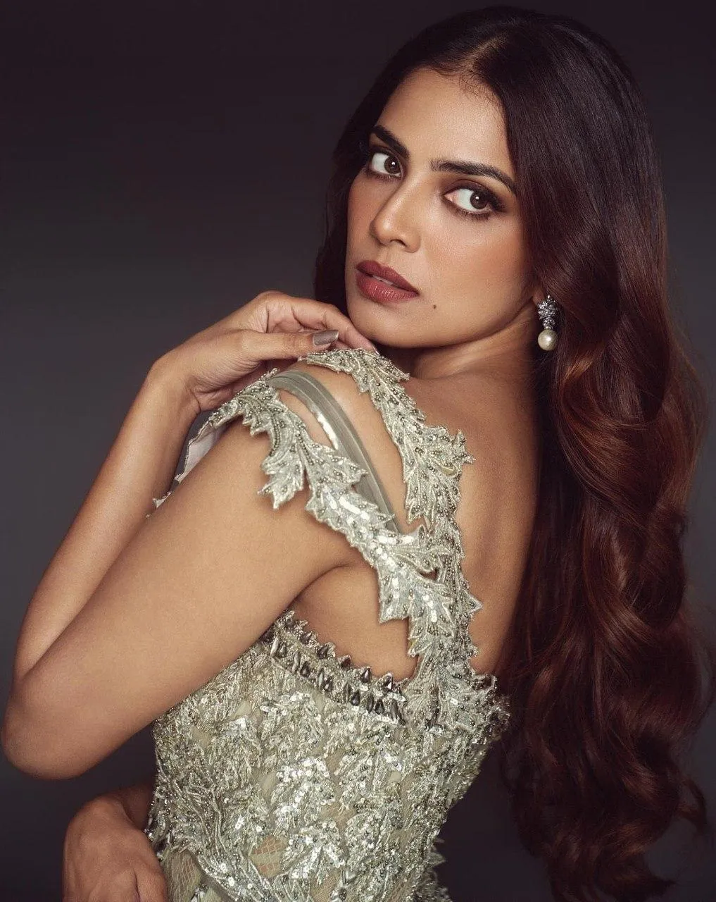Elegant Malavika Mohanan in Silver Gown with Hot Attitude
