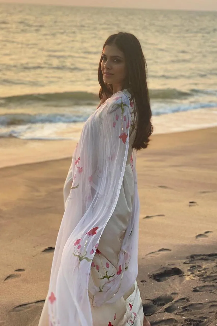 Glamorous Shot of Malavika Mohanan Beachside White Look