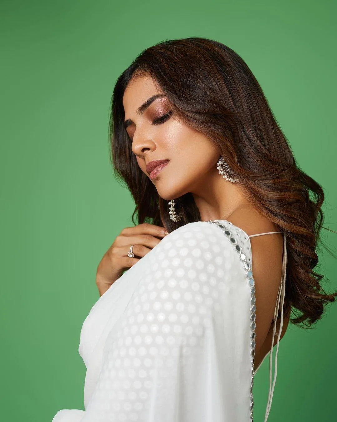 Glamorous Shot of Malavika Mohanan Elegant in White Outfit
