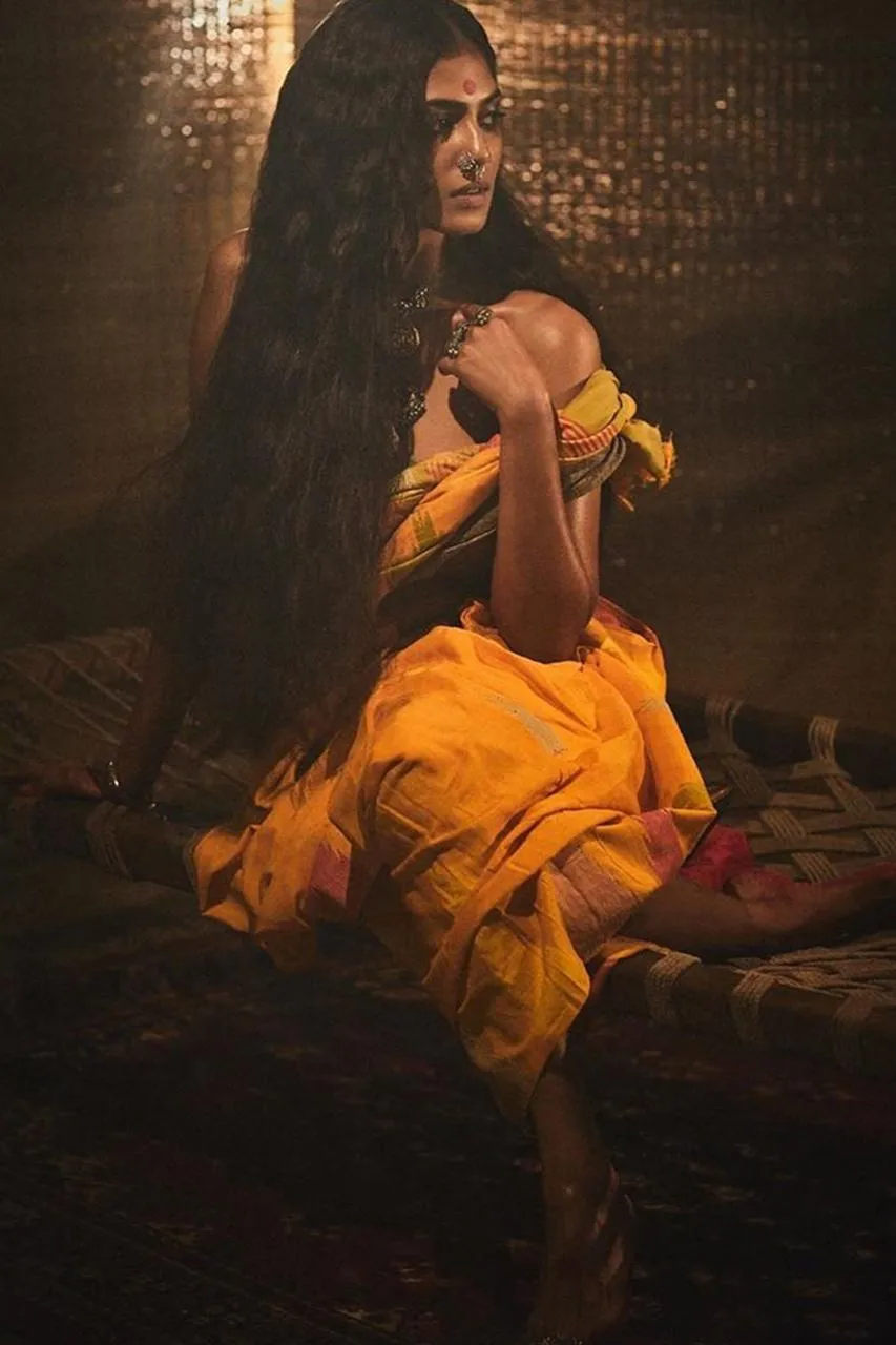 Glamour Pic of Malavika Mohanan in Yellow Designer Gown