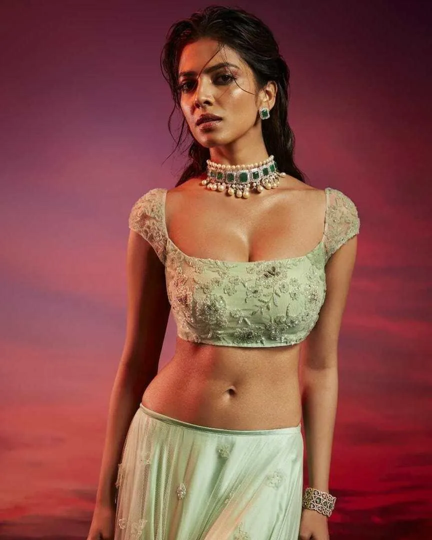 Glamour Pic of Malavika Mohanan Stunning in Green Dress
