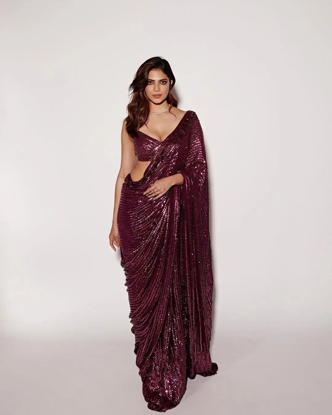 Glamour Pic of Malavika Mohanan Stylish in Maroon Gown Image