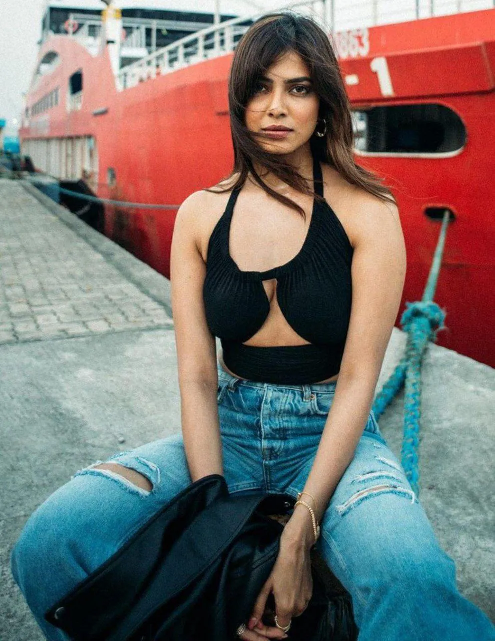 Gorgeous Malavika Mohanan in Black Top and Denim Look