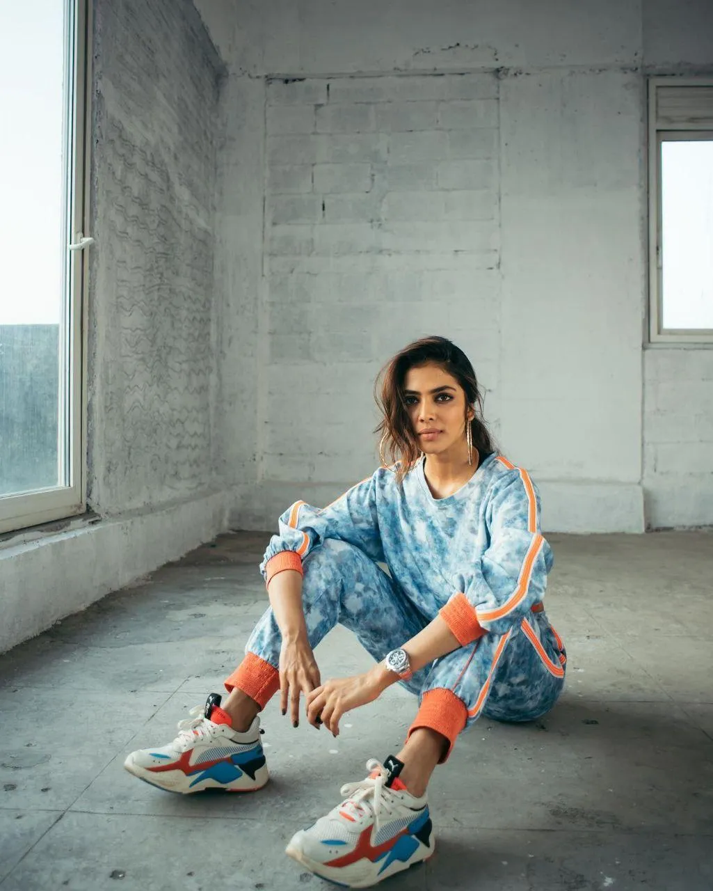 Gorgeous Malavika Mohanan in Blue Outfit Sitting Stylish