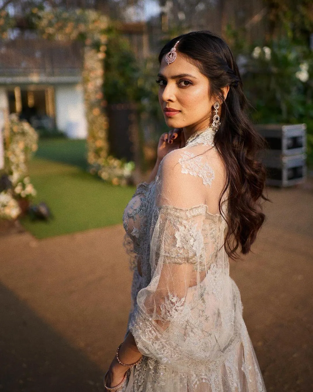 Gorgeous Malavika Mohanan in Grey Lace Gown with Open Curls