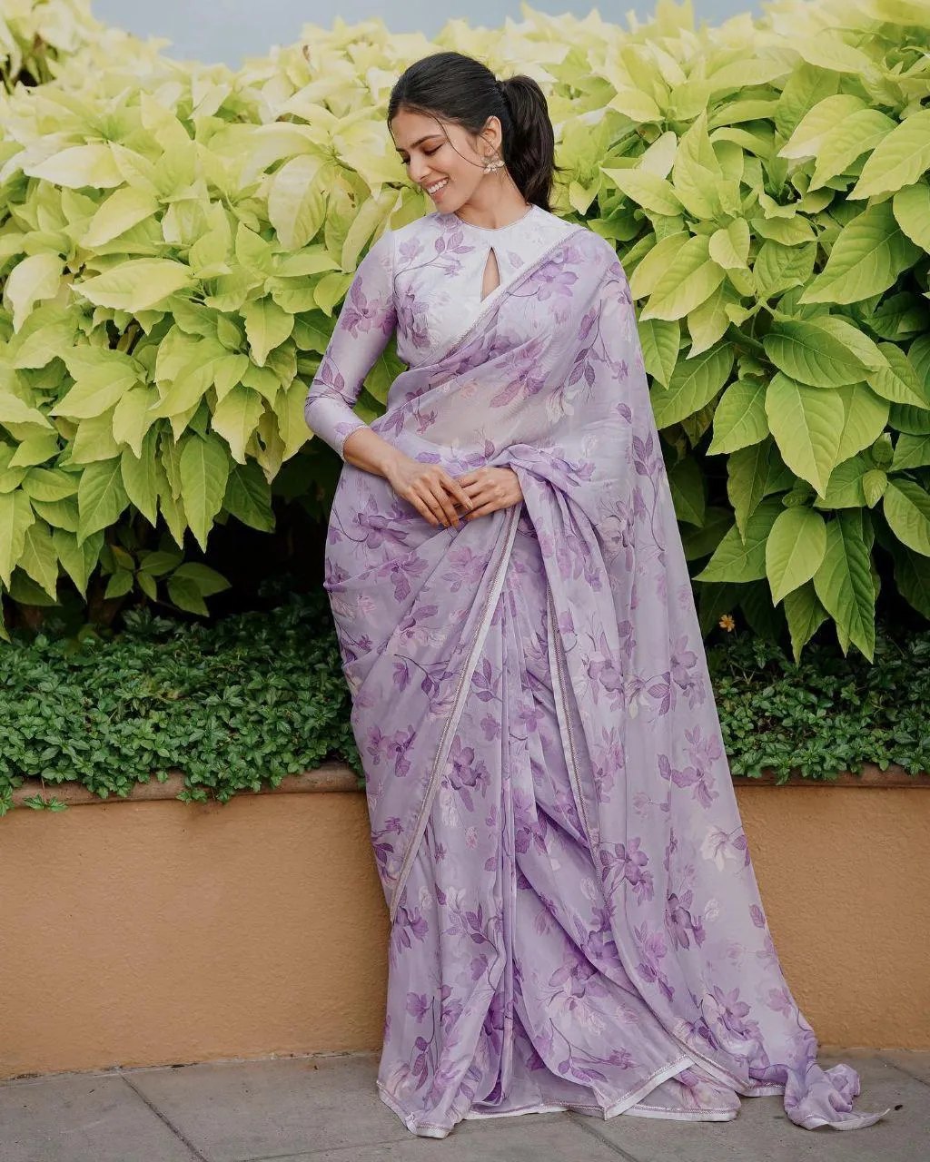 Gorgeous Malavika Mohanan in Lavender Saree Garden Pose
