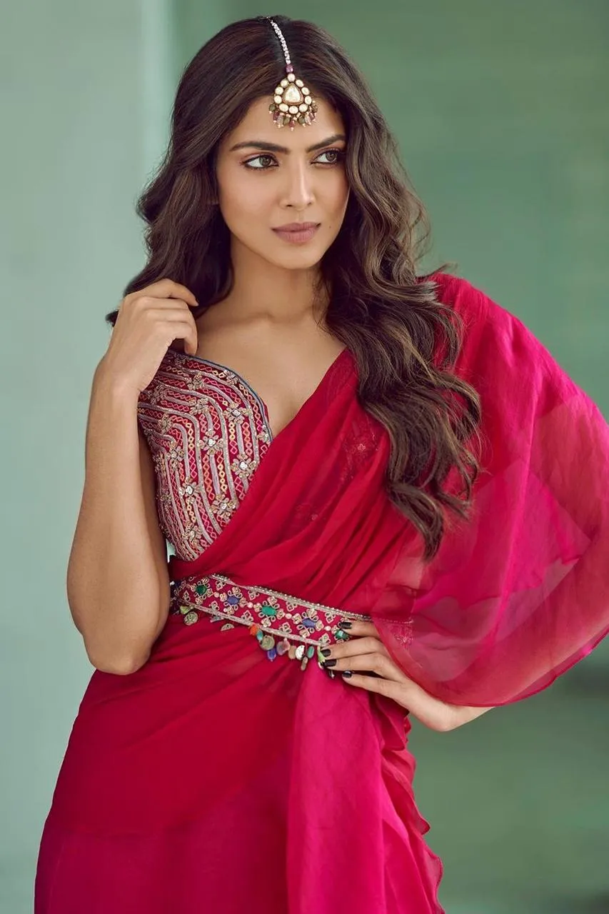 Gorgeous Malavika Mohanan in Red Outfit Striking Pose Image