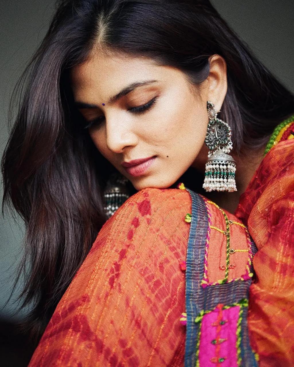 Gorgeous Malavika Mohanan in Red Saree with Graceful Pose
