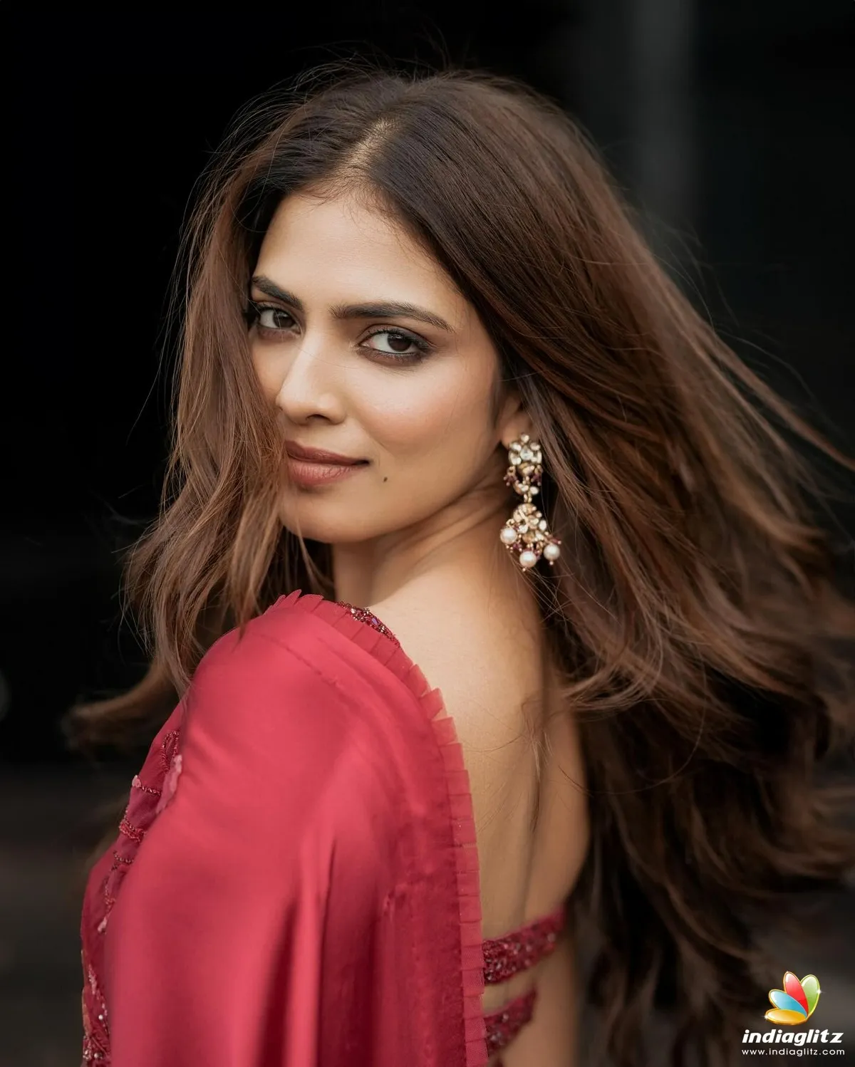 Gorgeous Malavika Mohanan in Side Look Long Hair Wallpaper