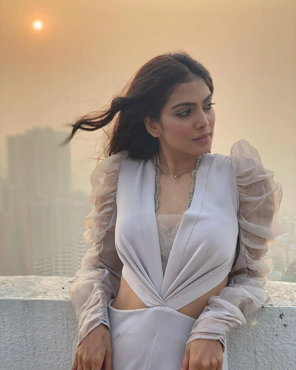 Gorgeous Malavika Mohanan in White Blouse Rooftop Look