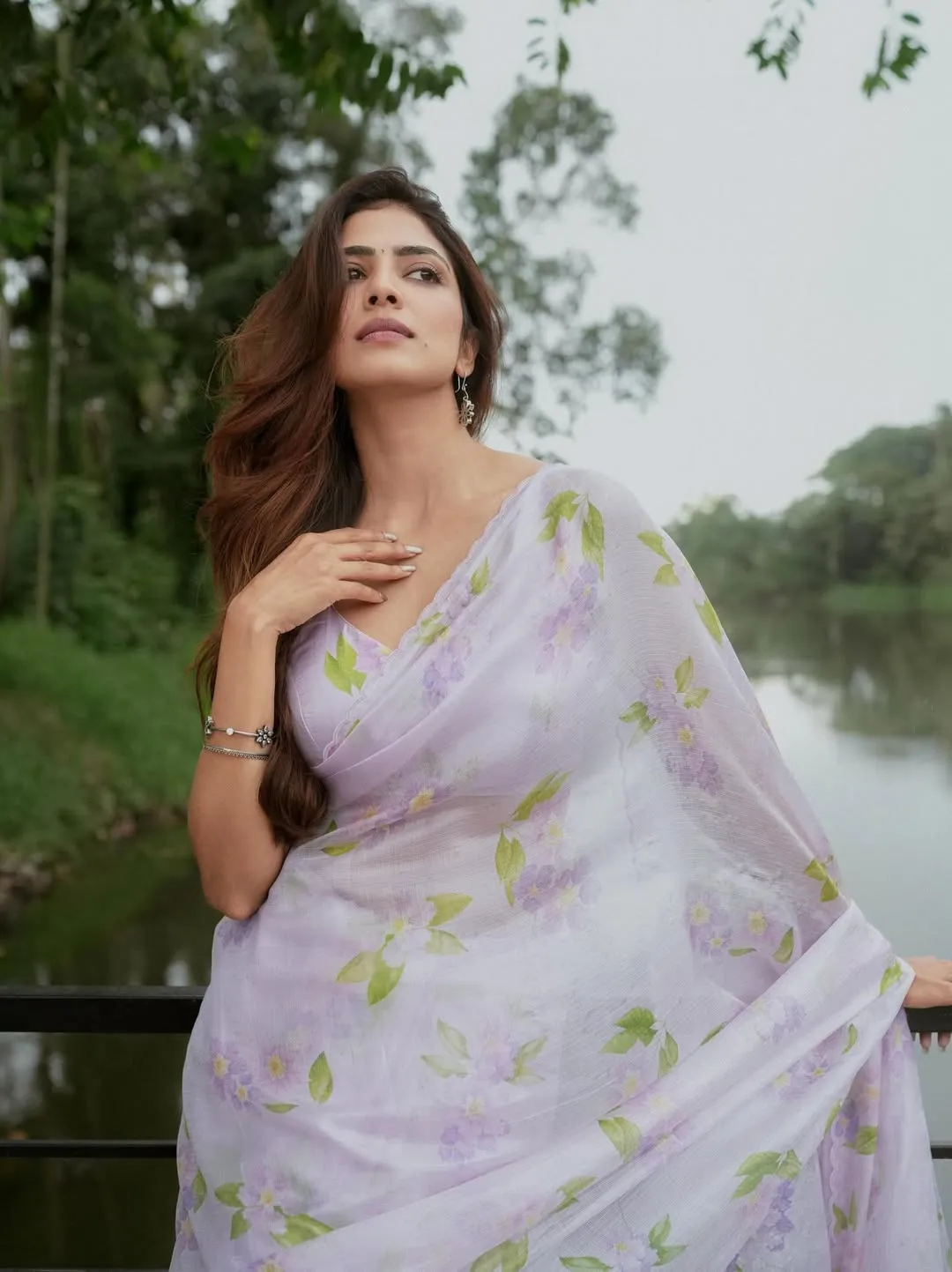 Gorgeous Malavika Mohanan in White Saree Floral Charm Image
