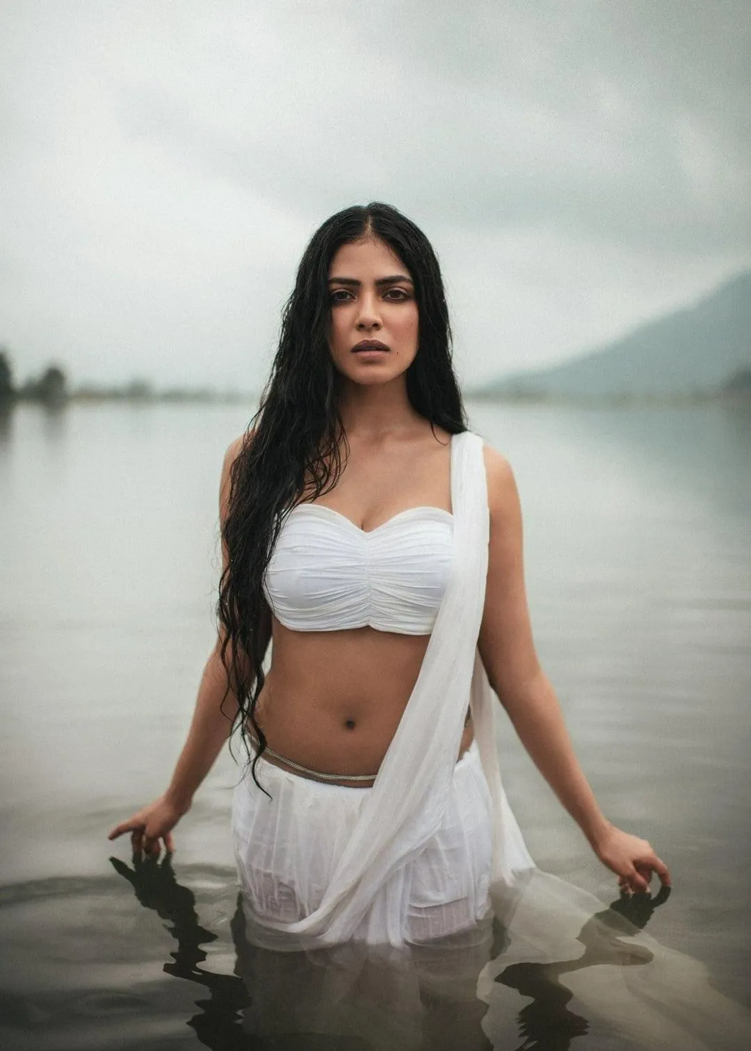 Gorgeous Malavika Mohanan in White Stylish Modern Dress