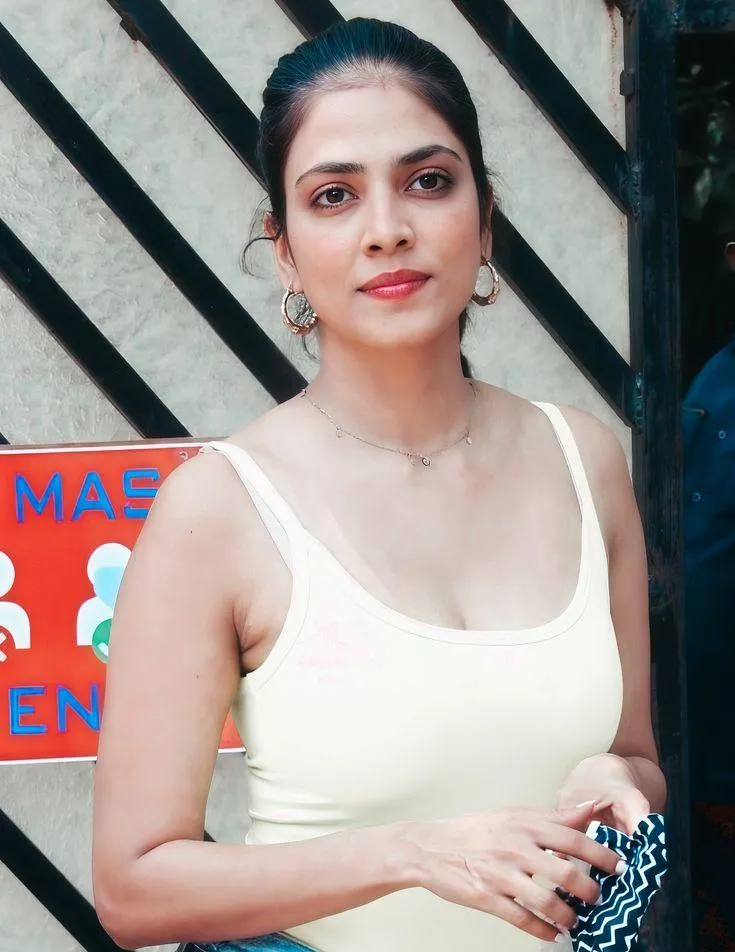 Gorgeous Malavika Mohanan in White Top Outdoor Portrait