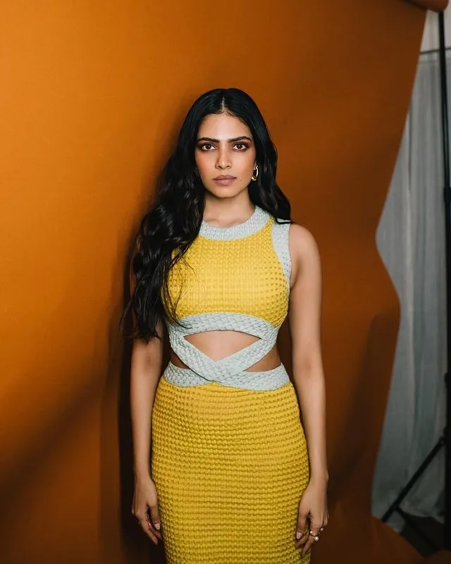 Gorgeous Malavika Mohanan in Yellow Skirt and Top Wallpaper