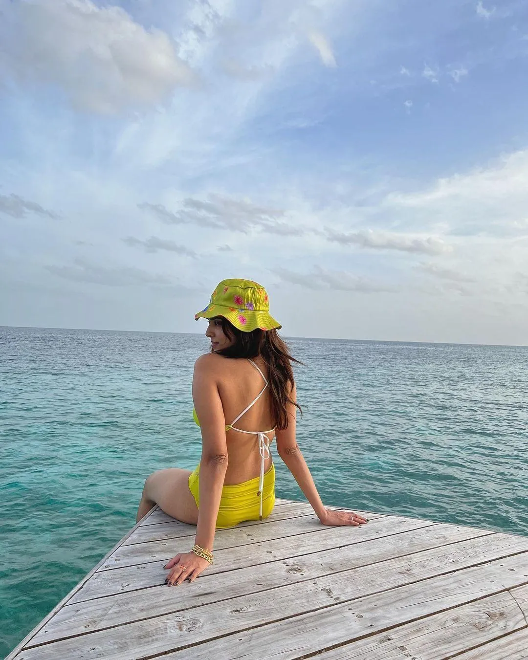Gorgeous Malavika Mohanan Sitting by the Sea Water View