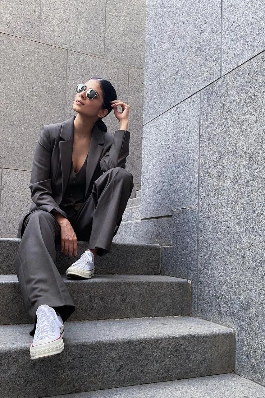 Gorgeous Malavika Mohanan Sitting on Stairs in Black Picture