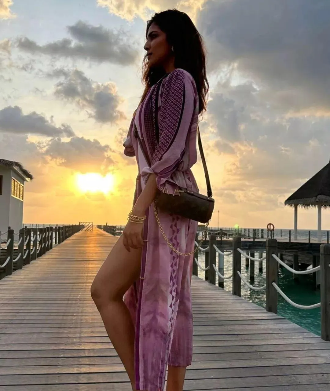 Gorgeous Malavika Mohanan Stunning Sunset Fashion Pose Image