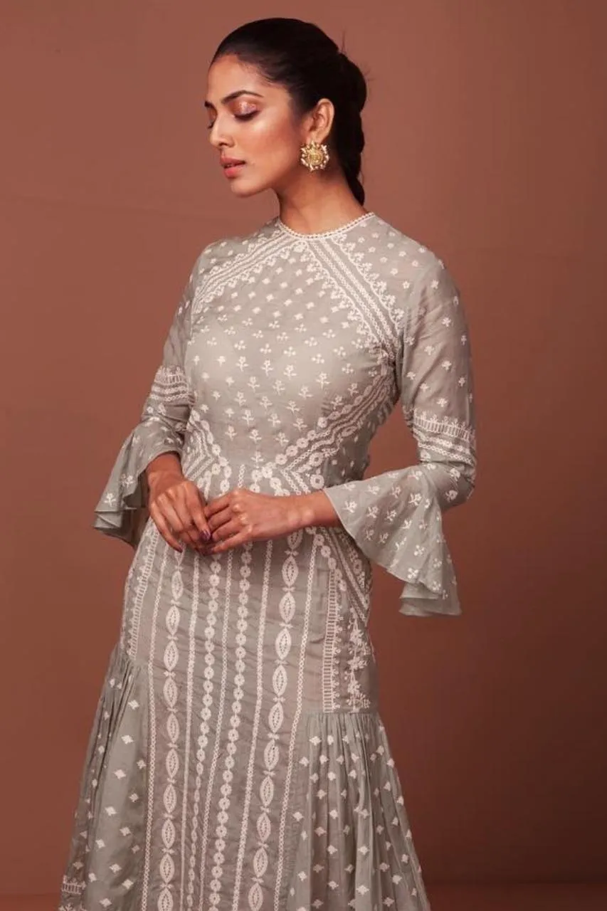Gorgeous Malavika Mohanan Wearing a Lovely White Dress Image