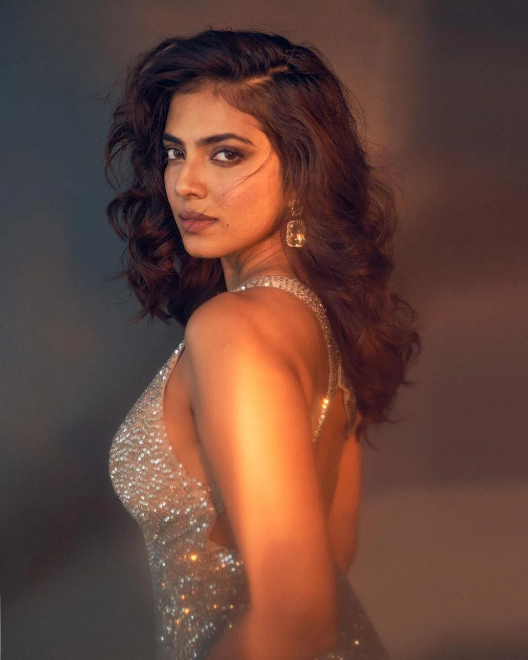 Gorgeous Malavika Mohanan Wearing Golden Dress Stylishly