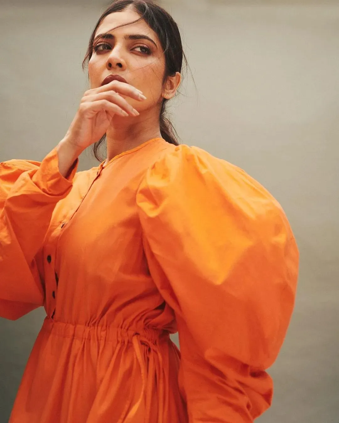 Gorgeous Malavika Mohanan Wearing Orange Puff Sleeve Dress
