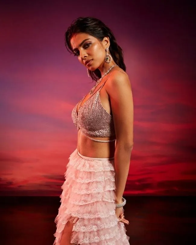 Gorgeous Picture of Malavika Mohanan Posing in Red Dress