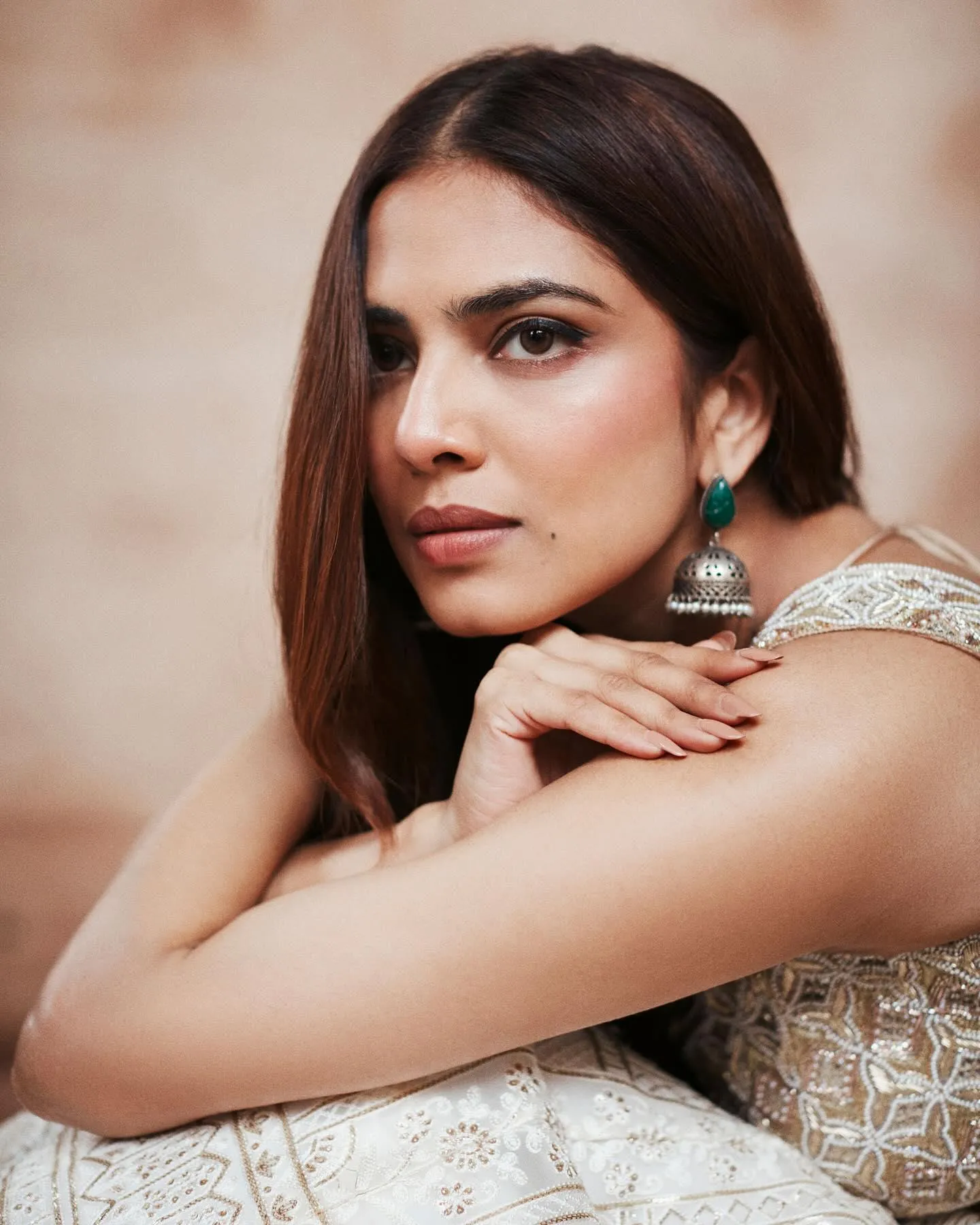 Handsome Malavika Mohanan in Golden Blouse with Side Pose