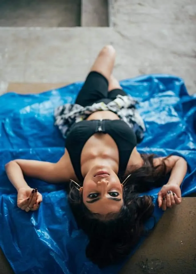 Handsome Malavika Mohanan Relaxing Calmly by the Water Image