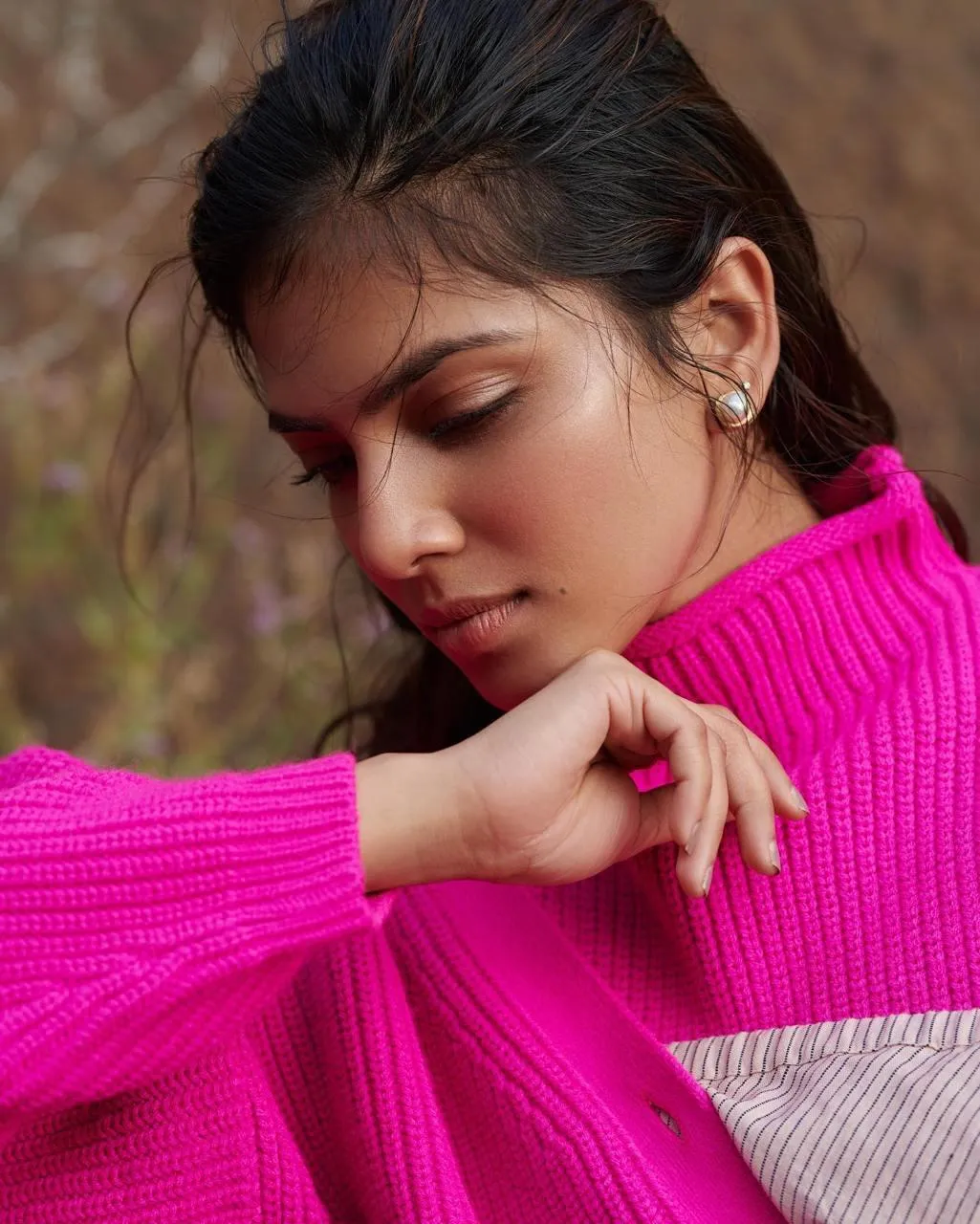 Hot Malavika Mohanan in Bright Pink Sweater Candid Photo