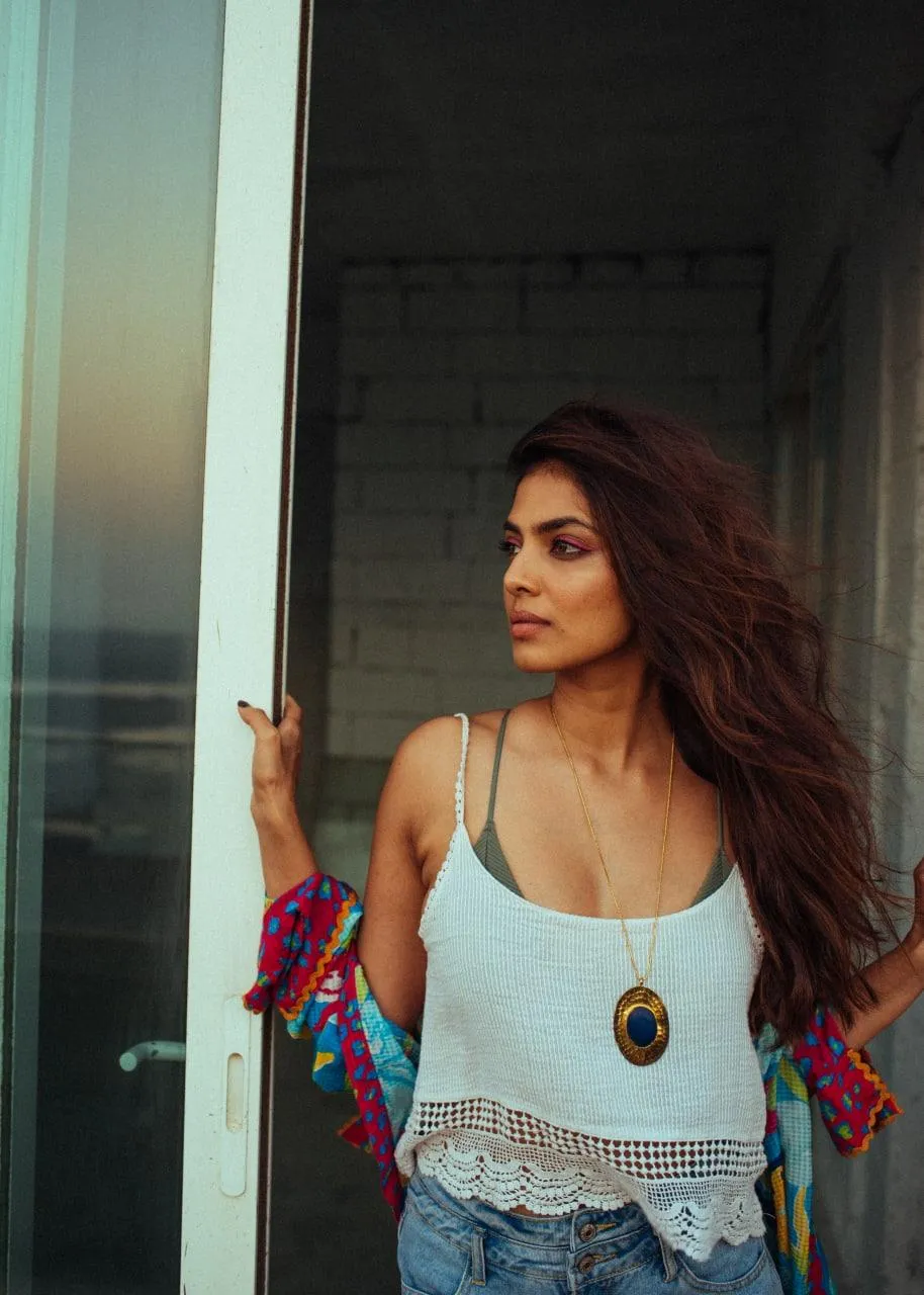 Hot Malavika Mohanan in Denim Shorts and Printed Jacket Pose