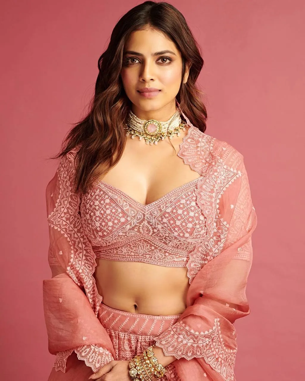Hot Malavika Mohanan in Pink Blouse and Lehenga Stylish Pose
