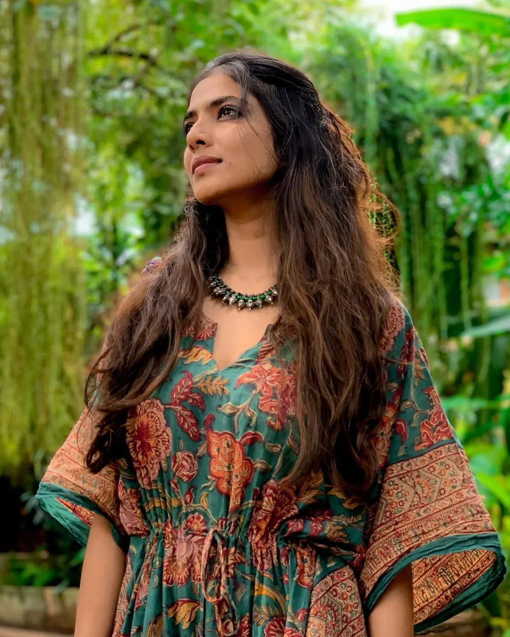 Hot Malavika Mohanan in Printed Top Outdoor Pose Wallpaper
