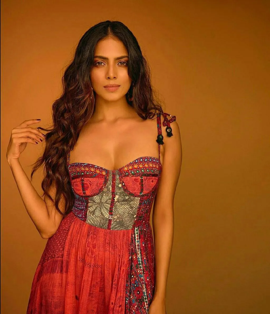 Hot Malavika Mohanan in Red Printed Gown Looking Stylish
