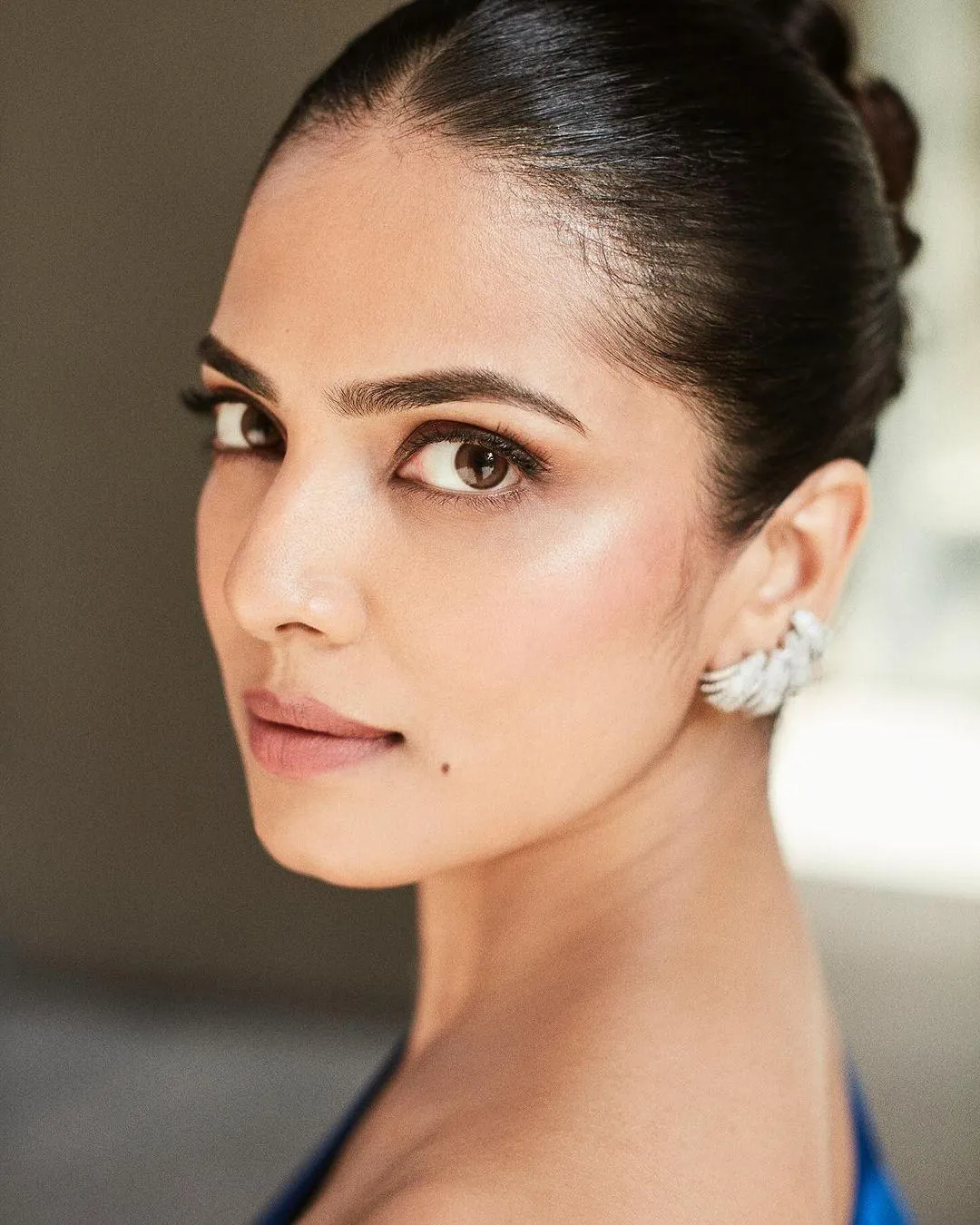 Hot Malavika Mohanan in Sleek Bun Hairstyle Close Profile